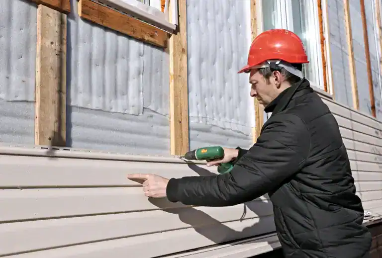 High-quality siding repair by Home Team Construction in St. James, NY. Expert craftsmanship for dura.
