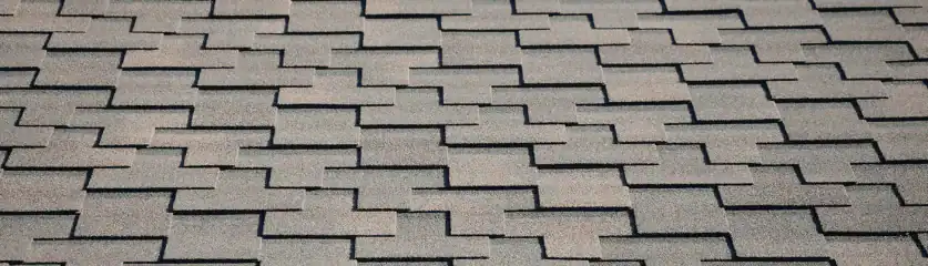 Close-up of architectural shingles on a residential roof.