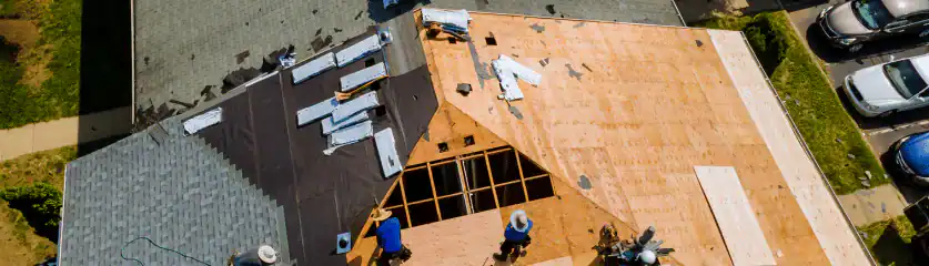 New asphalt shingle roof installation on a residential home. Expert roofing services by Home Team Co.
