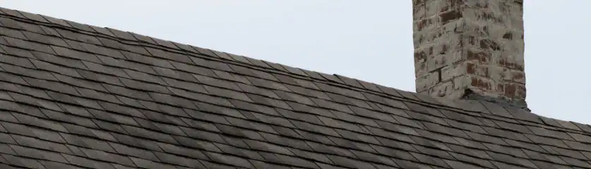 Roof leak repair service on residential property in Long Island.